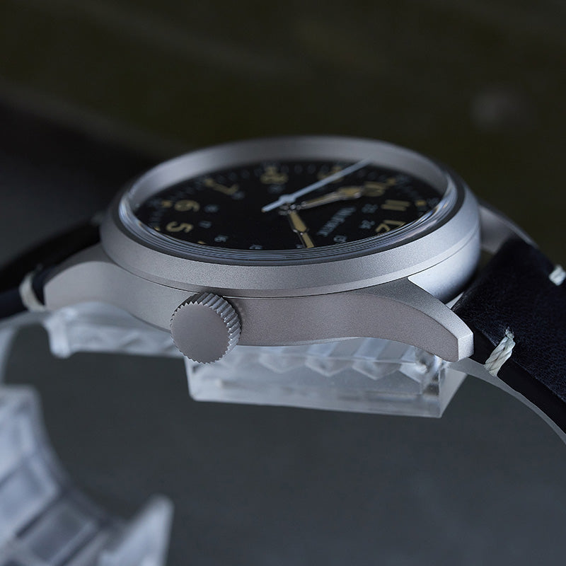M052 watch with brushed finish case and brushed finish crown, side view